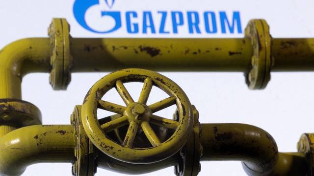 Illustration shows Natural Gas Pipes and Gazprom logo