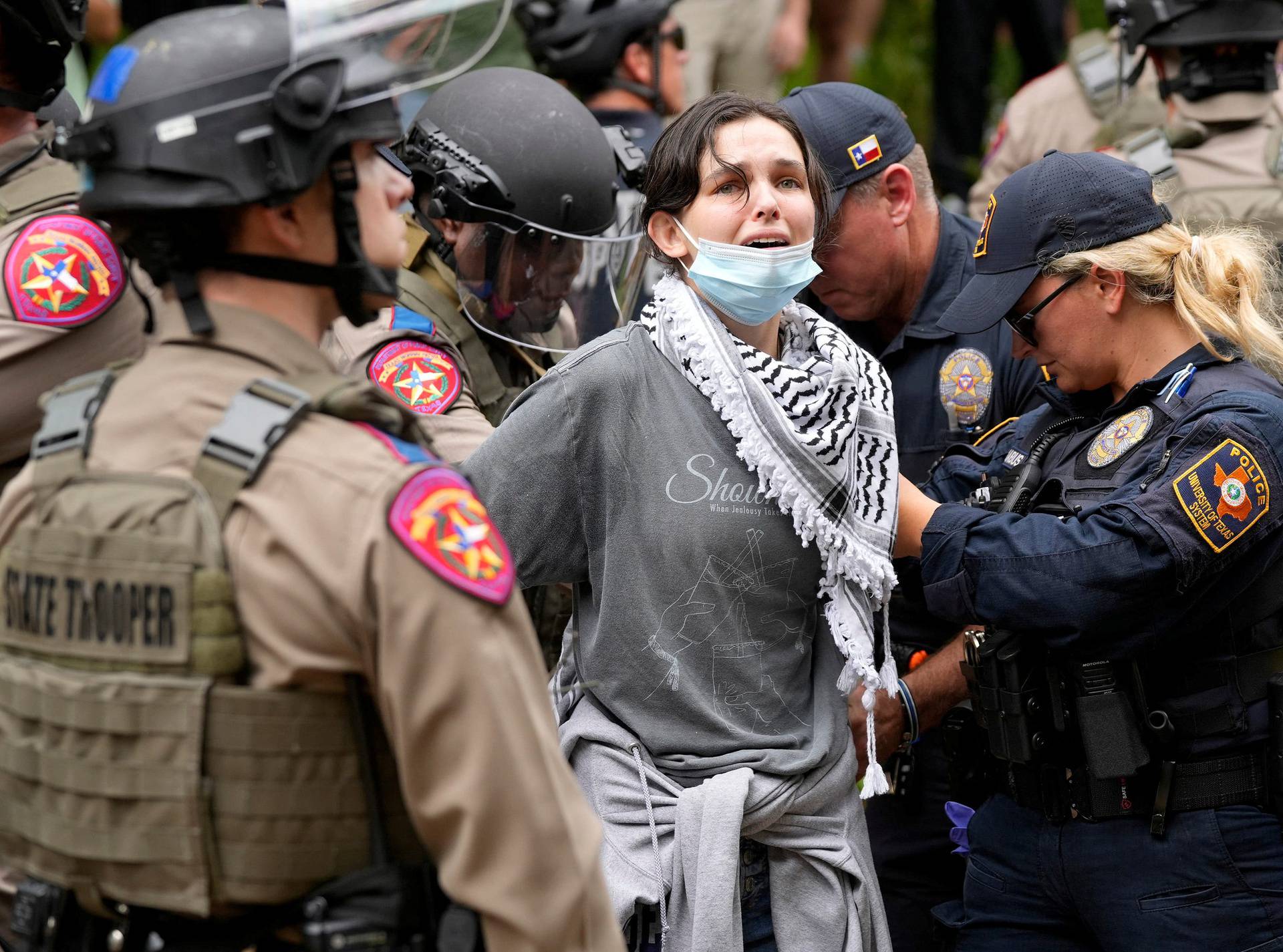 Texas state troopers arrest a man at a pro-Palestinian protest at the University of Texas