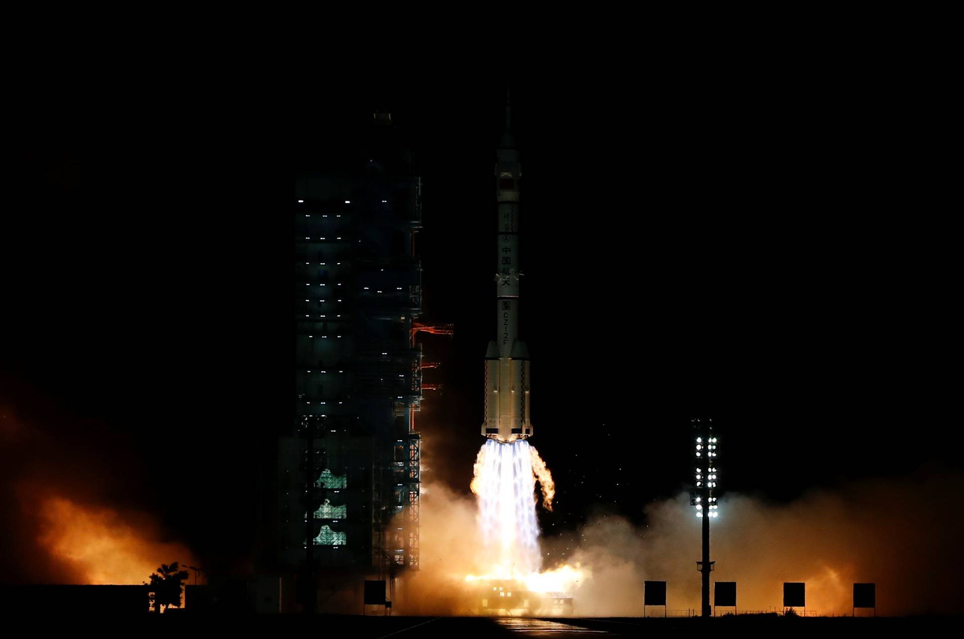 Launch of Long March-2F Y13 rocket near Jiuquan