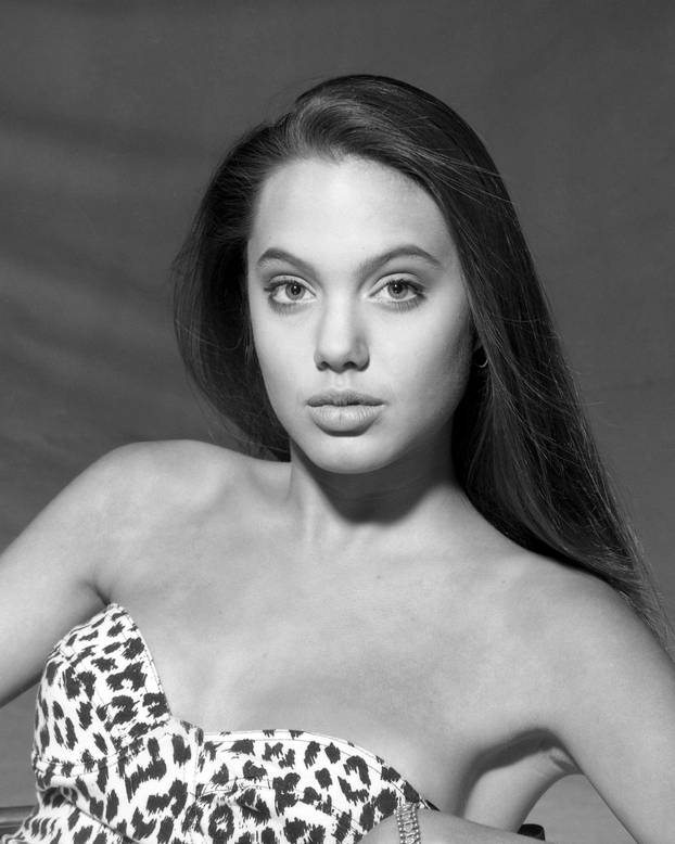Portrait of Angelina Jolie taken in 1989 at the age of 15  Credit: Harry Langdon/Rock Negatives/MediaPunch