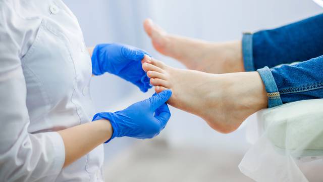 Podiatry,Doctor,Examines,The,Foot