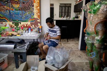 Filipino artist Leeroy New shifts to designing makeshift masks amid coronavirus pandemic