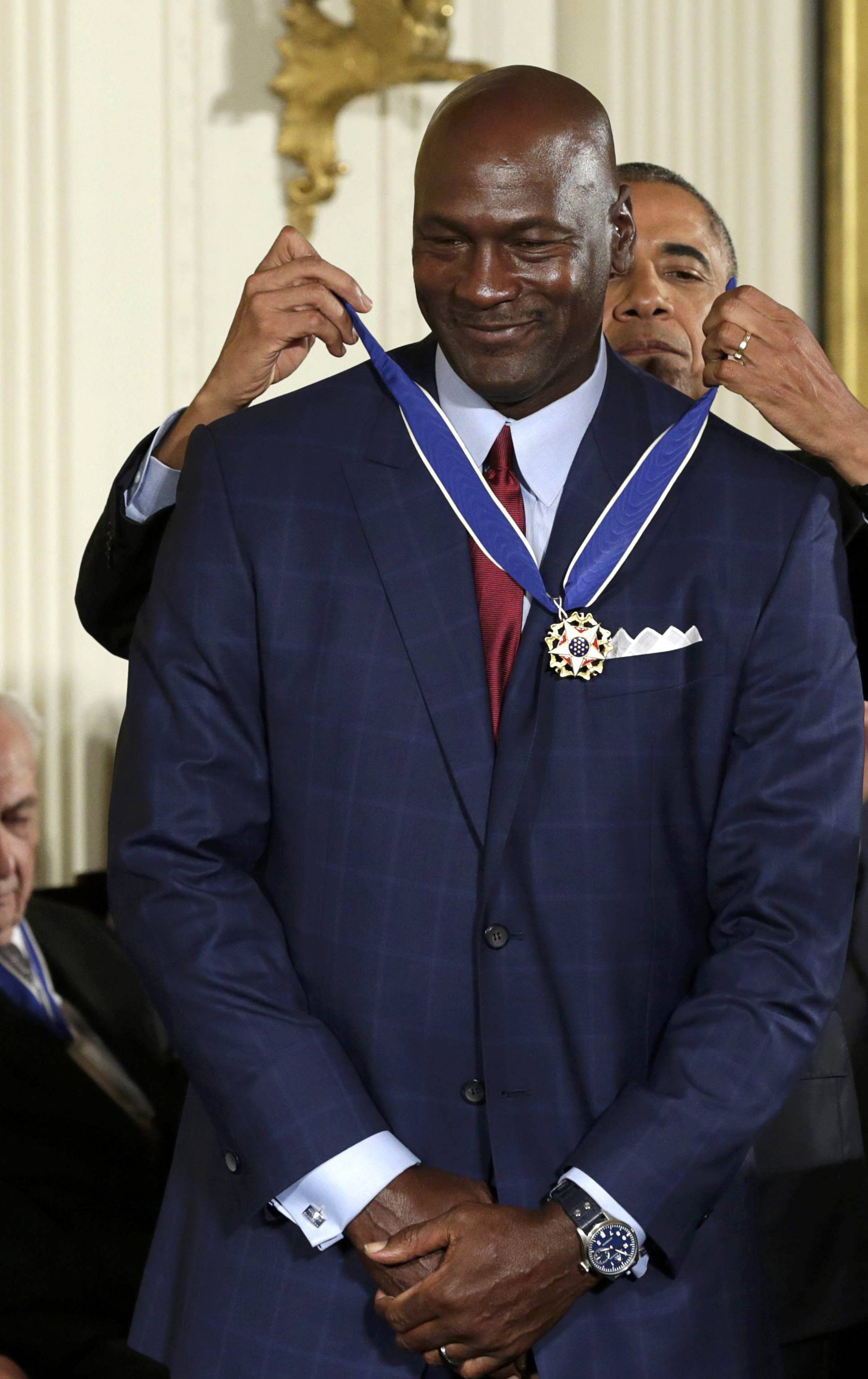 President Obama puts Presidential Medal of Freedom on NBA star Jordan at White House in Washington