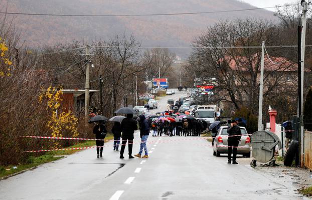 Kosovo Serbs block the road near the village of Rudine