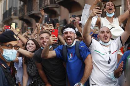 The Italy team drive through Rome on a open top bus tour after they won Euro 2020