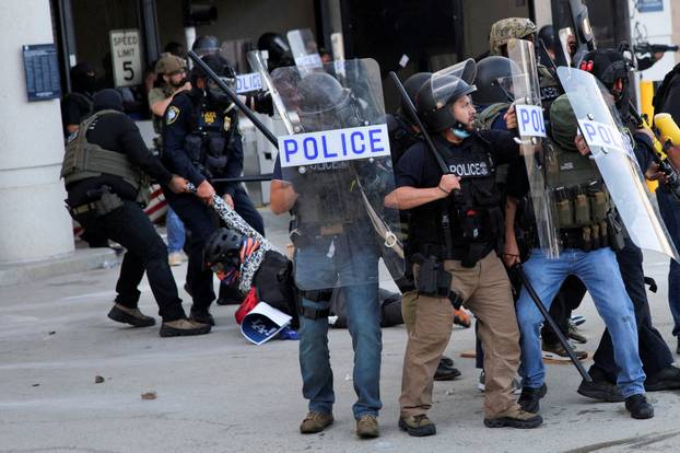 FILE PHOTO: Protesters gather around the Los Angeles Federal Building after multiple detentions by ICE, in Los Angeles