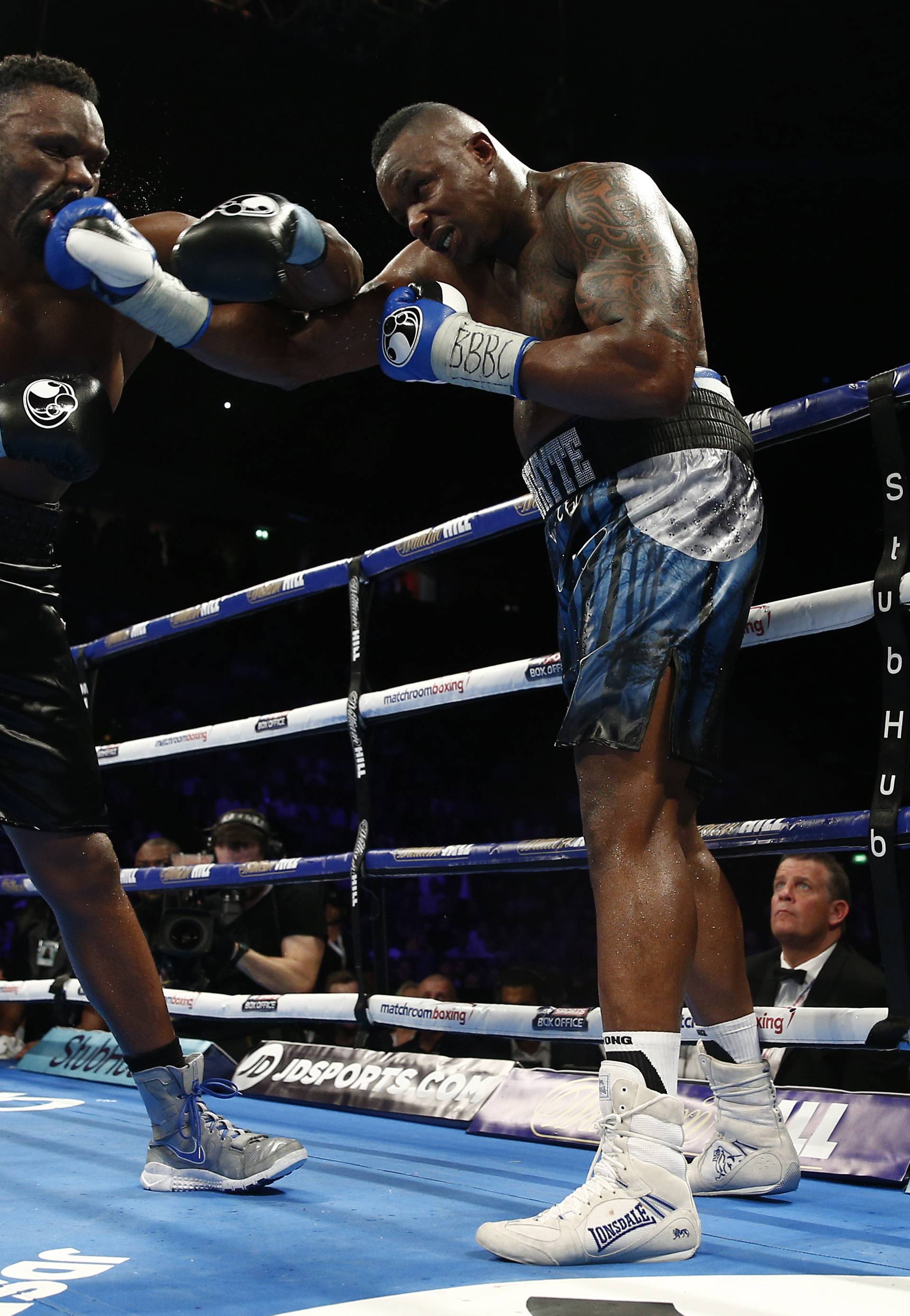 Dillian Whyte (R) in action against Dereck Chisora