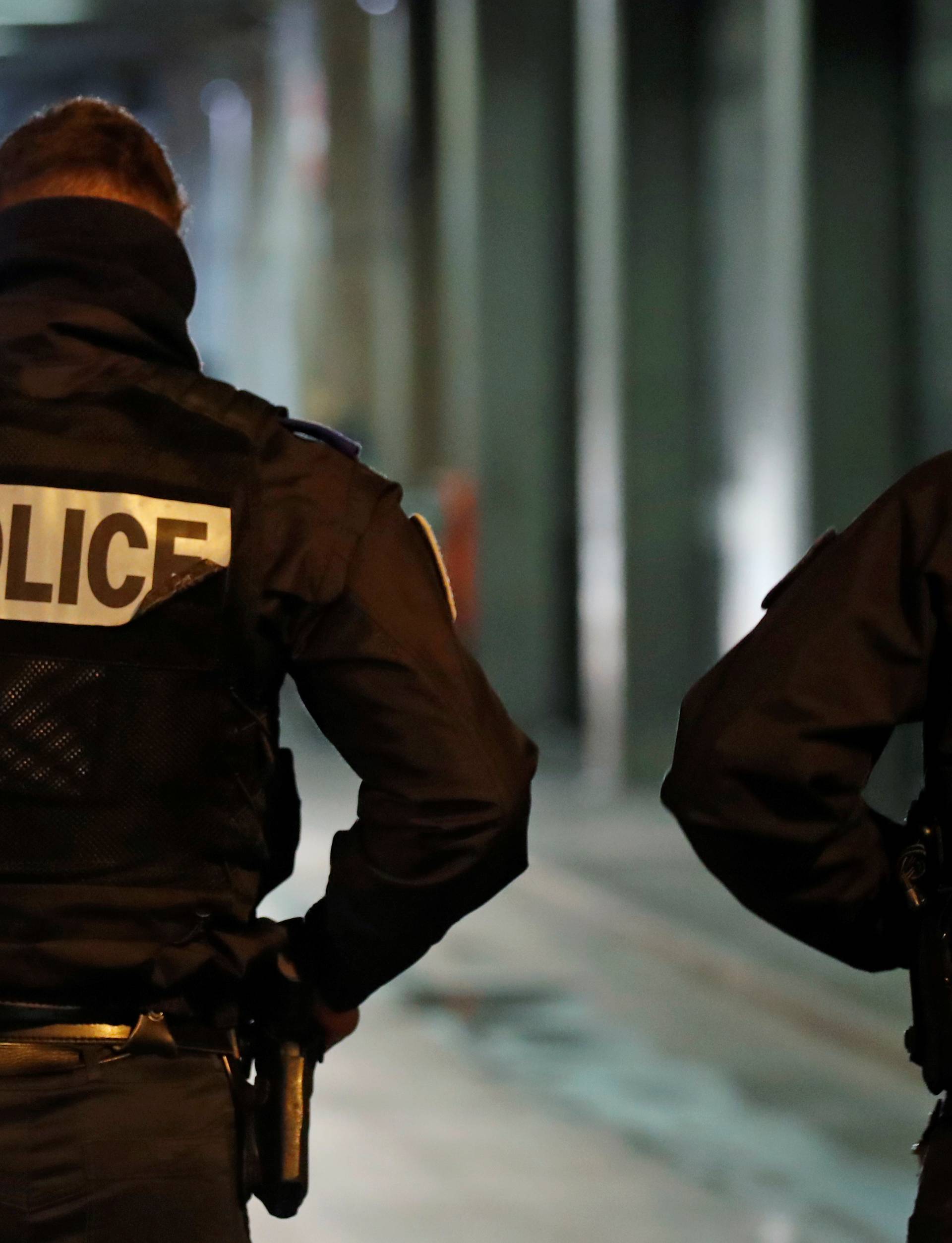 French police secure an area at La Defense business and financial district near Paris