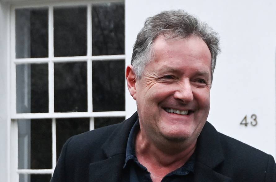 Piers Morgan walks near his house in London