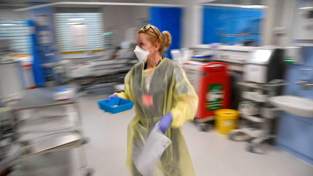 FILE PHOTO: Medical staff treat seriously ill Covid patients at Milton Keynes University Hospital, amid the spread of the coronavirus disease (COVID-19) pandemic, Milton Keynes, Britain