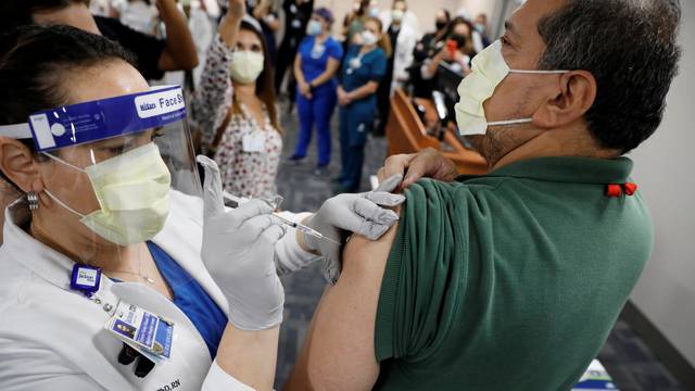 Health Care workers receive the Pfizer-BioNTech COVID-19 Vaccine in Florida