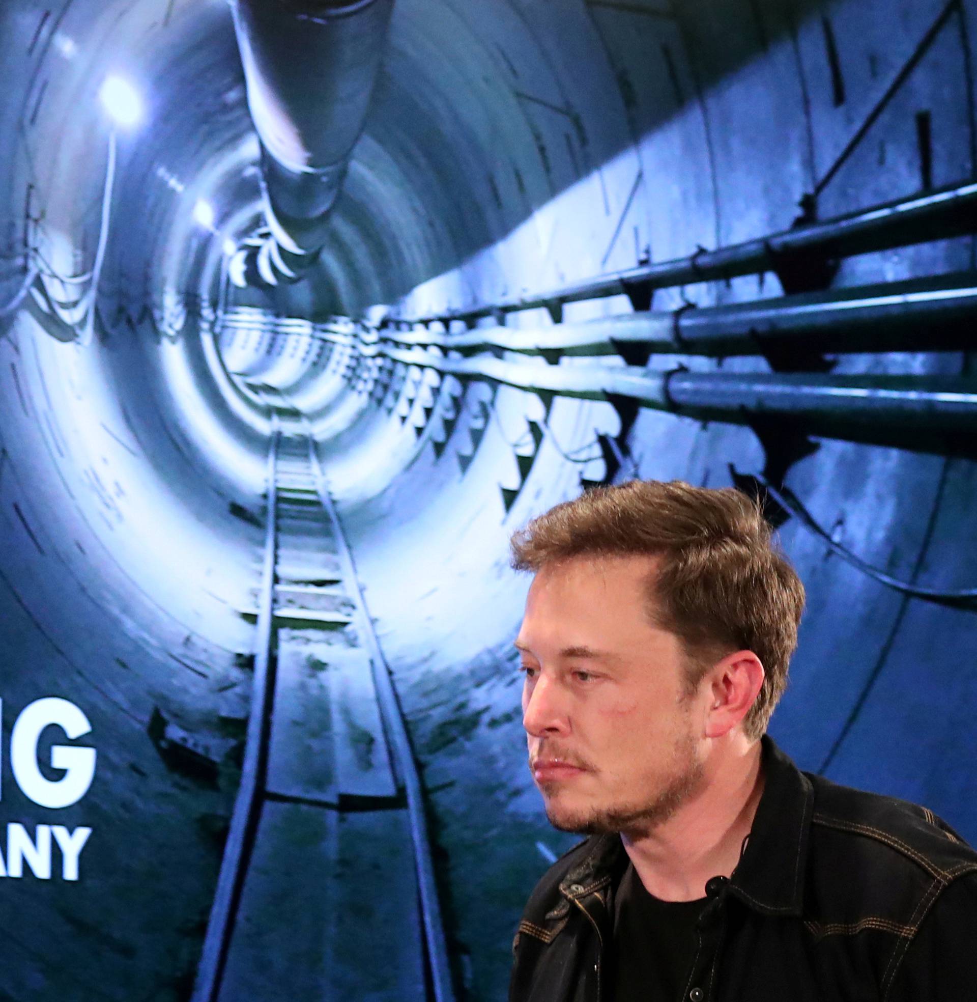 FILE PHOTO: Elon Musk arrives to speak at Boring Company community meeting in Bel Air, Los Angeles