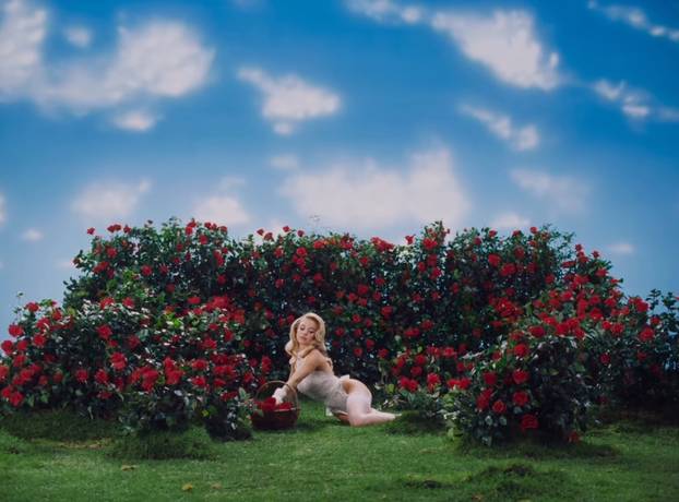 Stdney Sweeney does gardening in new lingerie range