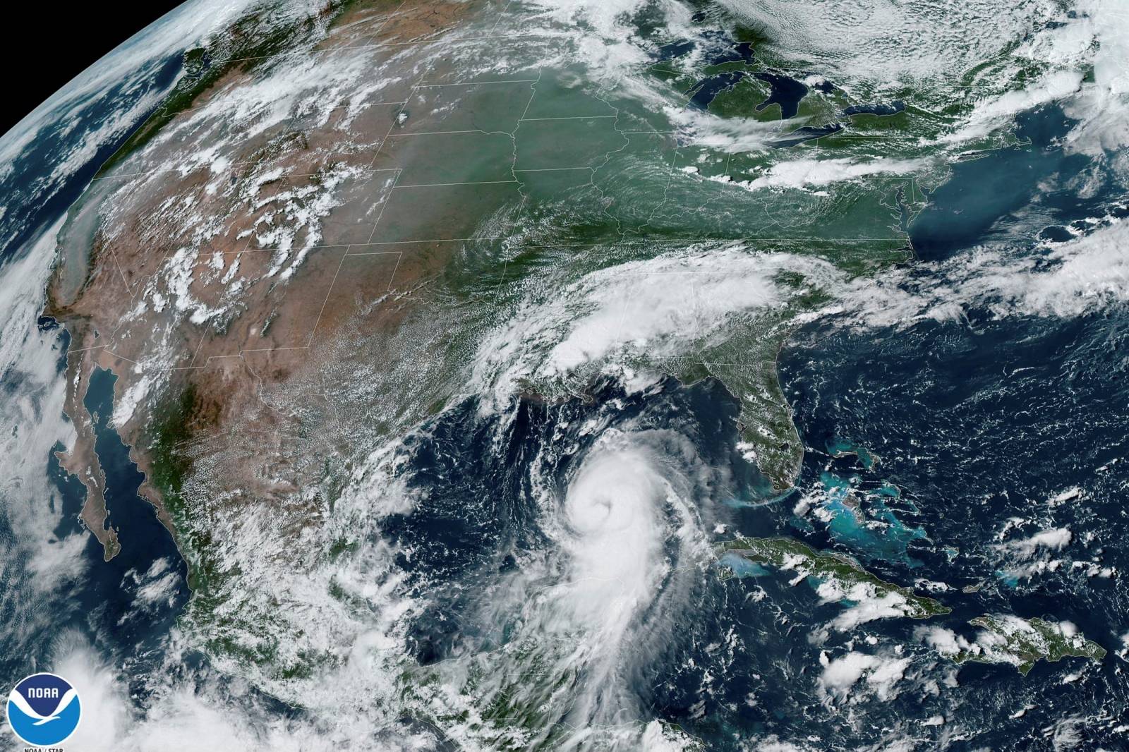 Hurricane Laura arroaches the coasts of Texas and Louisiana in an image from the NOAA GOES-East satellite