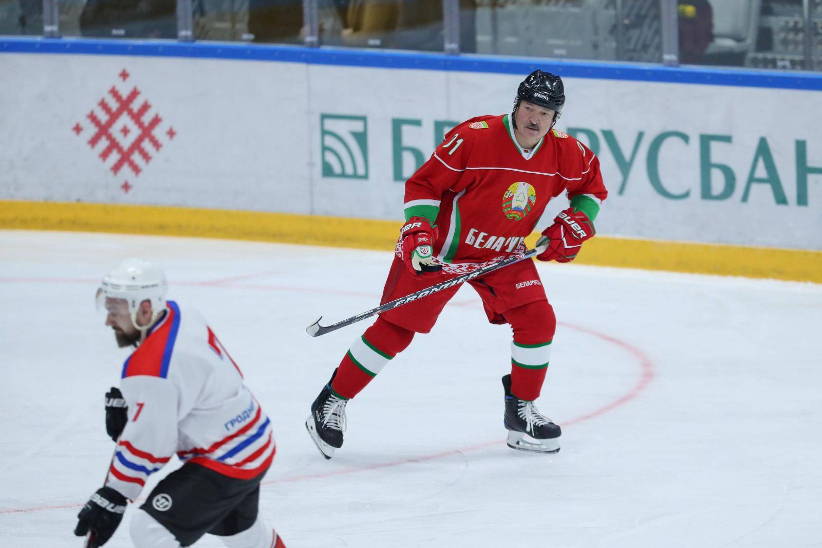 Belarusian President Alexander Lukashenko takes part in an amateur ice hockey game in Minsk