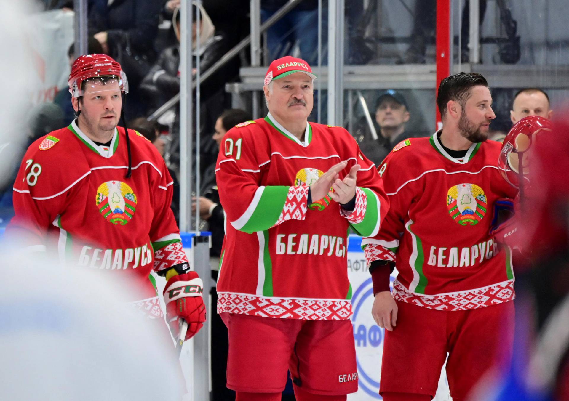 Belarusian President Alexander Lukashenko takes part in a hockey match