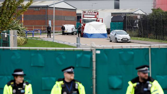 The scene where bodies were discovered in a lorry container, in Grays, Essex