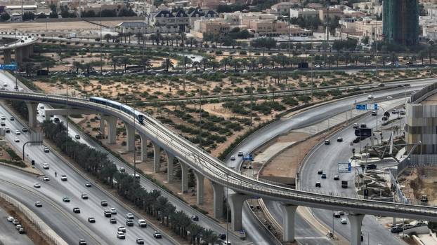 A train leaves the King Abdullah Financial District Metro Station in Riyadh, Saudi Arabia