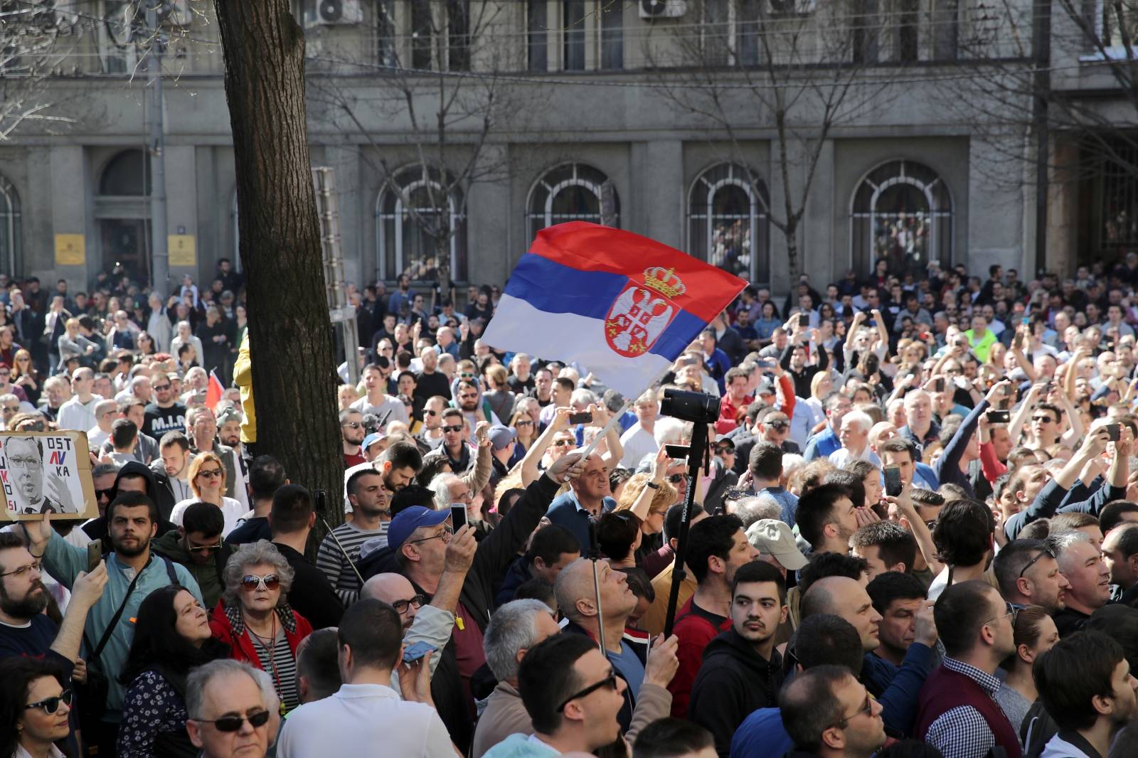 Demonstrators attend a protest against Serbian President Vucic and his government in front of the presidential building in Belgrade