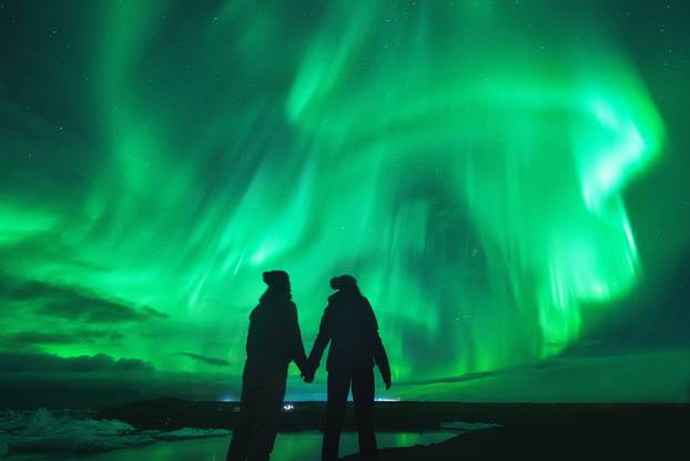 Northern,Lights,Over,Couple,In,Love,In,Iceland