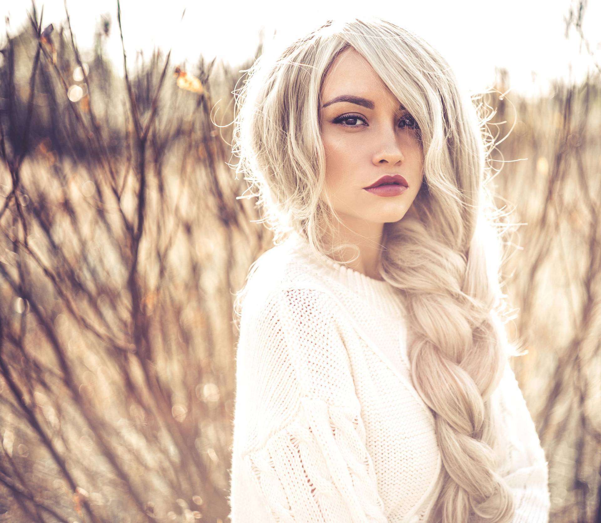 Beautiful lady in autumn landscape