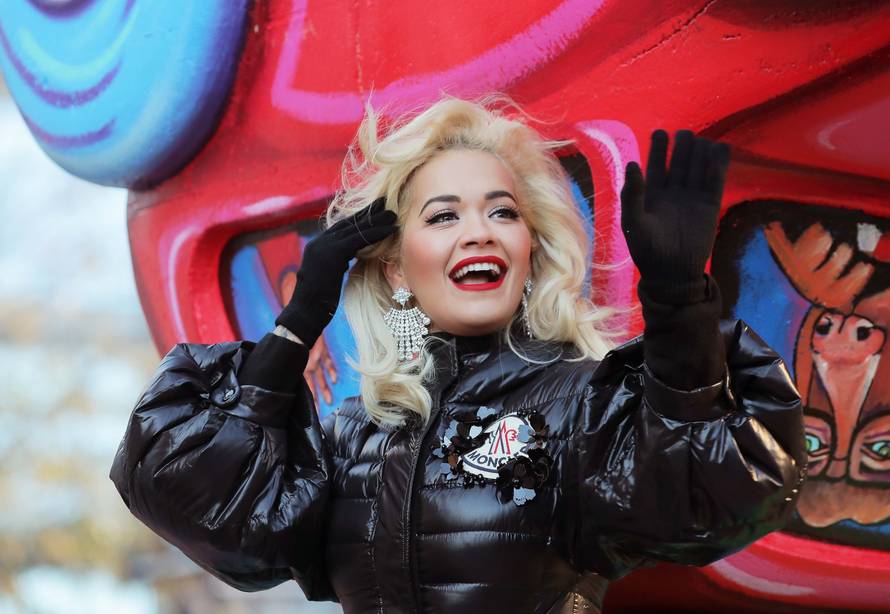 Singer Rita Ora waves to the crowd during the Macy's Thanksgiving Day Parade in Manhattan