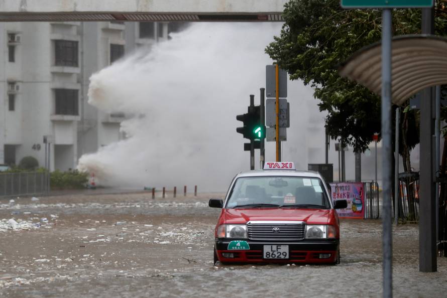 Waves triggered by Typhoon Hato are seen in Hong Kong