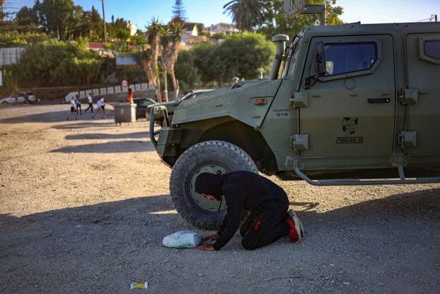 Mass crossings of migrants on foot and by sea from Morocco into Spanish territory, in Ceuta