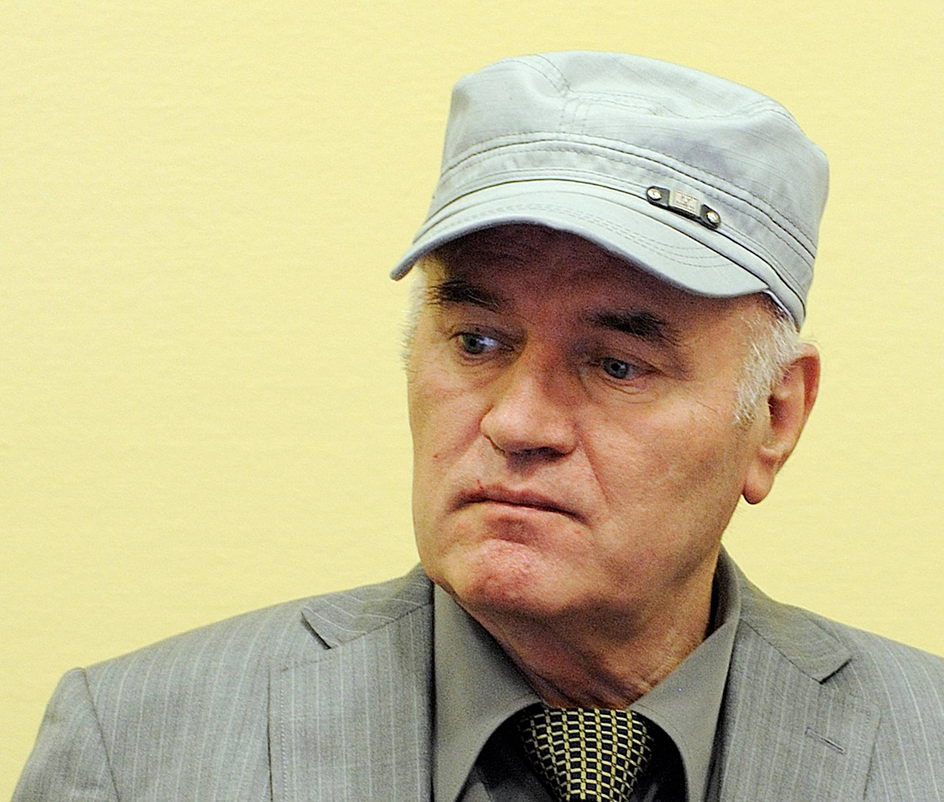 Former Bosnian Serb commander Ratko Mladic appears in court in the Hague
