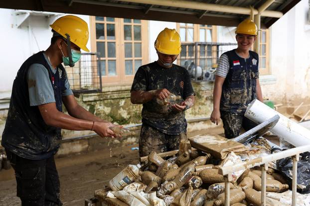 Aftermath of deadly flash flood triggered by heavy rains in Karang Baru