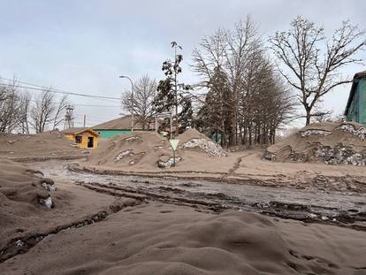 A view shows a street covered in volcanic dust following the eruption of Shiveluch volcano in the settlement of Klyuchi