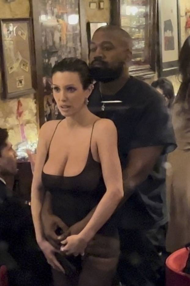 *PREMIUM-EXCLUSIVE* Kanye West and Bianca Censori cozy up in a sweet embrace at Ferdi