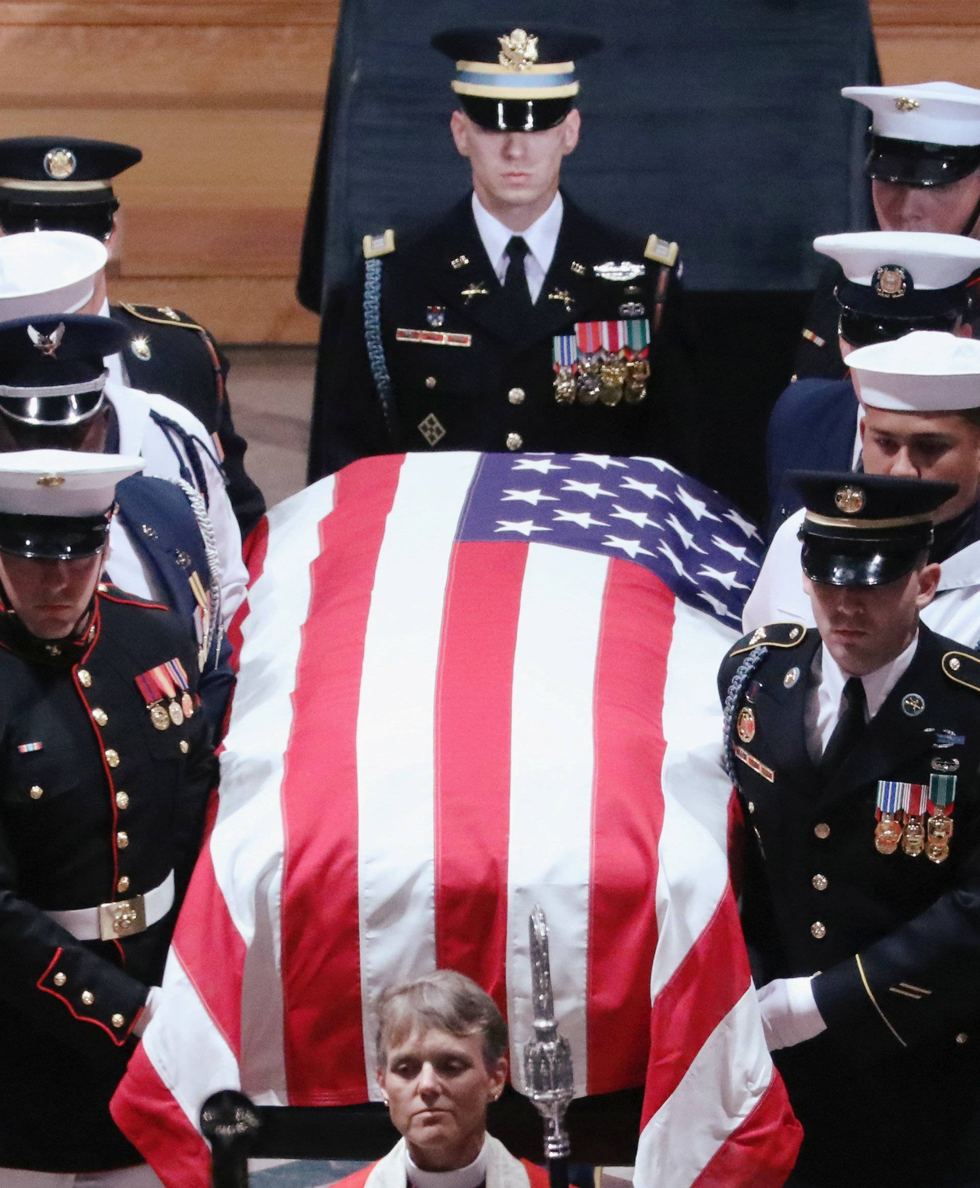 The casket is pictured leaving the memorial service of U.S. Senator John McCain at National Cathedral in Washington