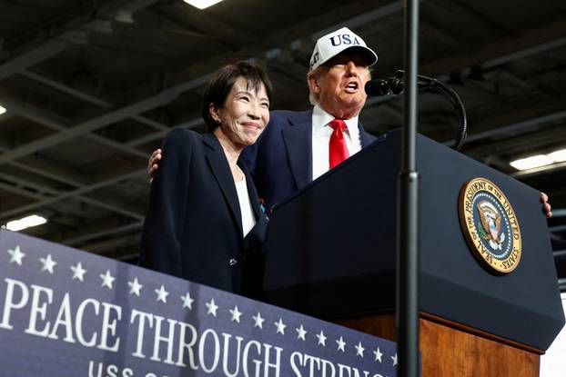 FILE PHOTO: U.S. President Donald Trump visits the aircraft carrier USS George Washington at Commander, Fleet Activities Yokosuka Navy base in Yokosuka