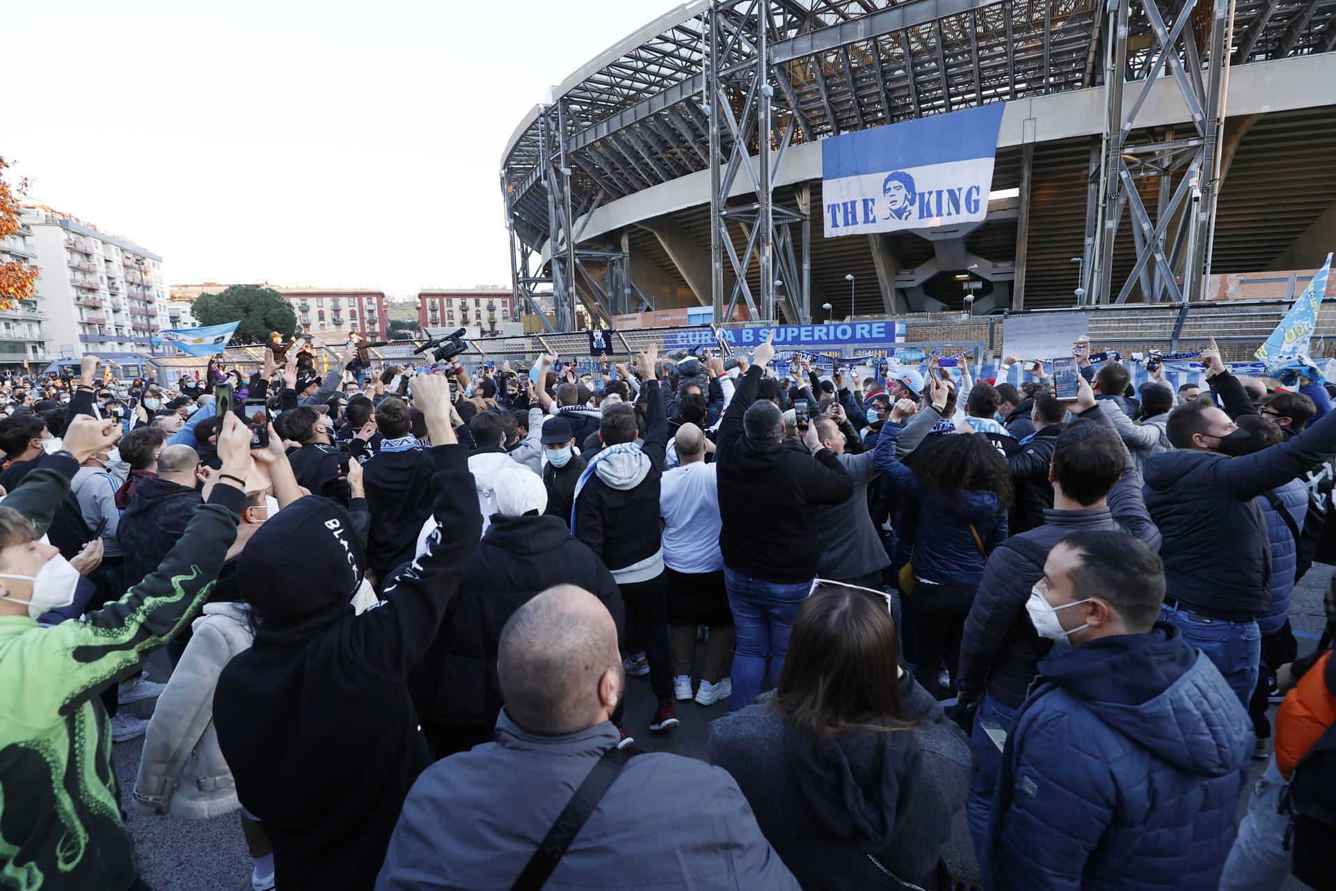 People mourn the death of Argentine soccer legend Diego Maradona, in Naples