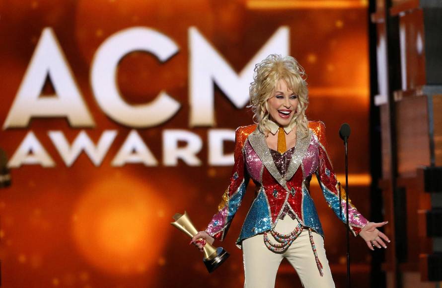 FILE PHOTO: Dolly Parton accepts the Tex Ritter Award during the 51st Academy of Country Music Awards in Las Vegas