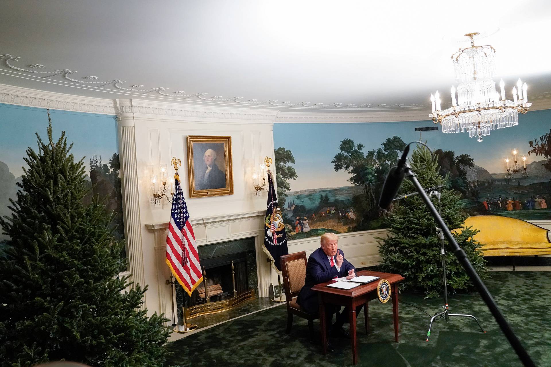 U.S. President Donald Trump speaks to reporters after participating in a Thanksgiving video teleconference with members of the military forces at the White House in Washington