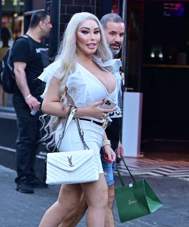 *EXCLUSIVE* Showing off her latest face lift, the Reality Star Jessica Alves showing a whole load of cleavage seen arm in arm with a mystery man in London's Soho.