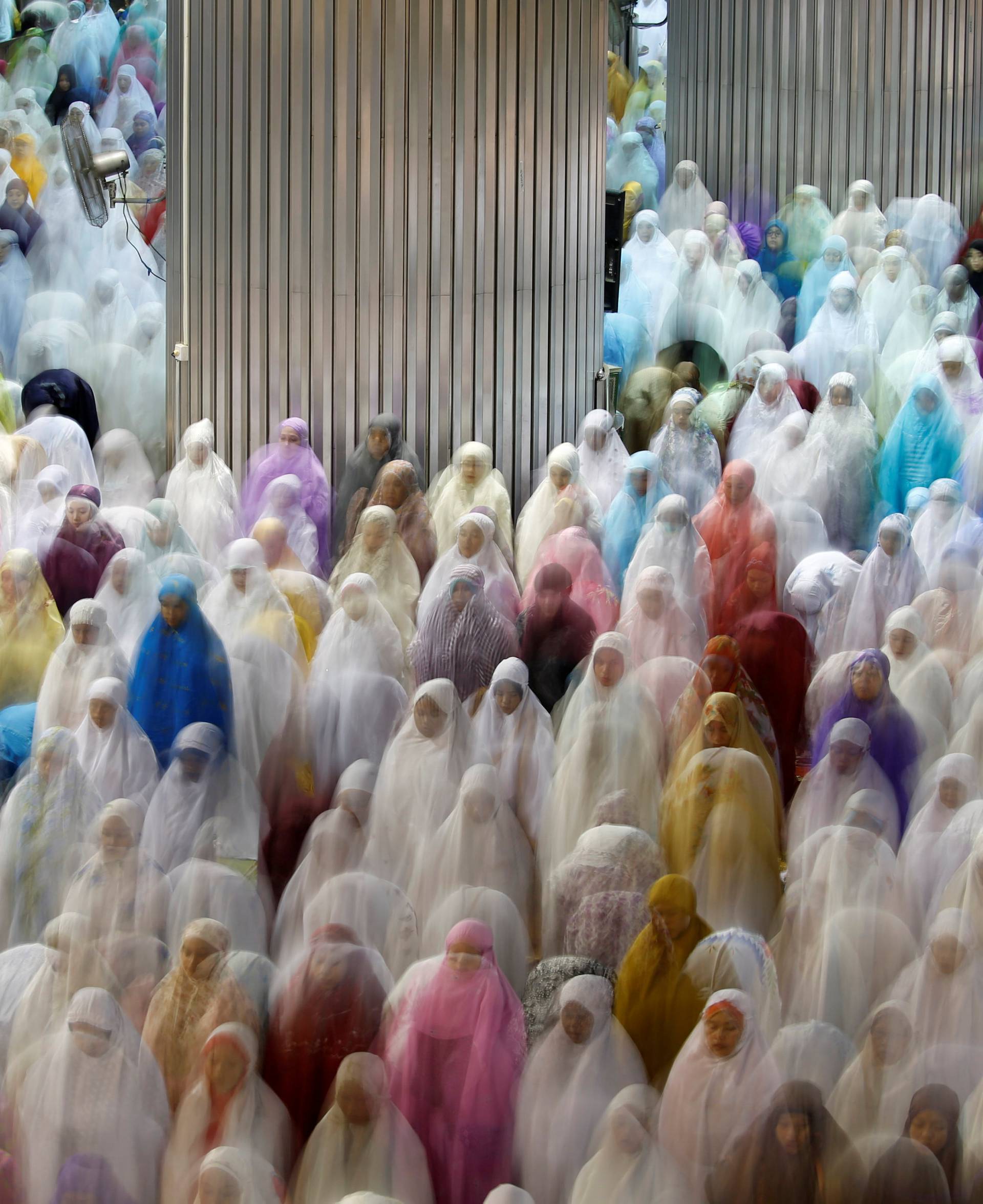 Muslims attend the Ramadan tarawih prayer at Istiqlal mosque in Jakarta, Indonesia