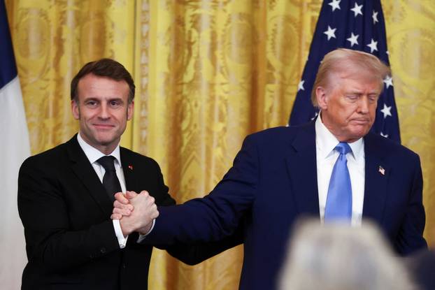 U.S. President Donald Trump and French President Emmanuel Macron hold a press conference, in Washington