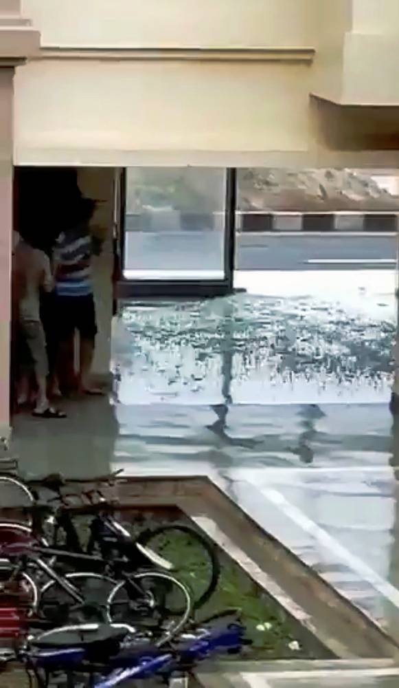 A window glass shatters during Cyclone Fani in Bhubaneswar, Odisha