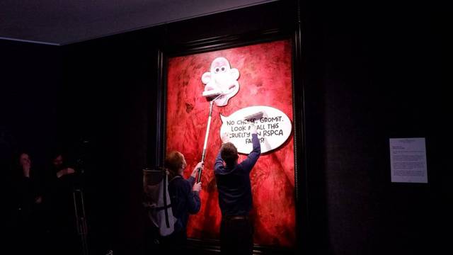 Animal Rising activists vandalise King Charles III portrait with “Wallace and Gromit” cutout