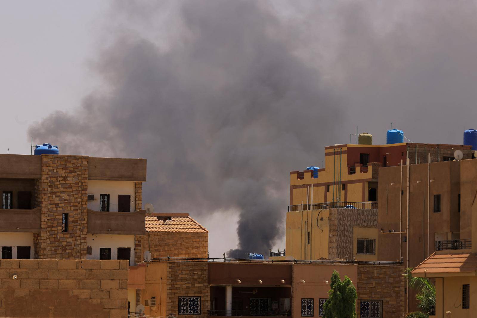 Smoke is seen rise from buildings in Khartoum North