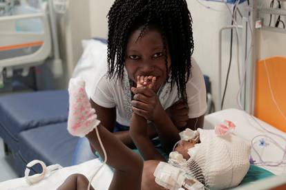 Two-year-old conjoined twins separated by Italian doctors in rare surgery in Rome
