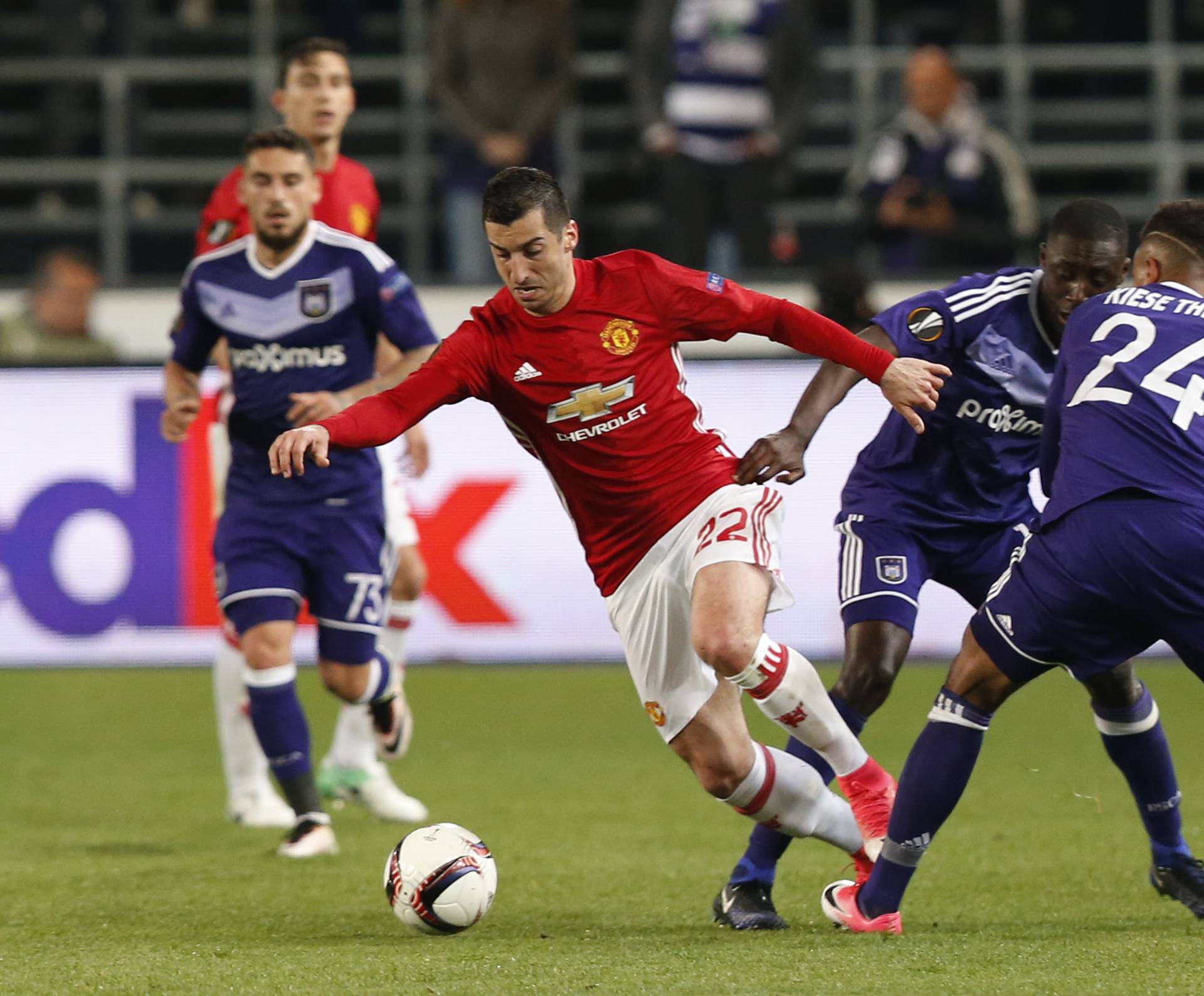 Manchester United's Henrikh Mkhitaryan in action with Anderlecht's Dennis Appiah