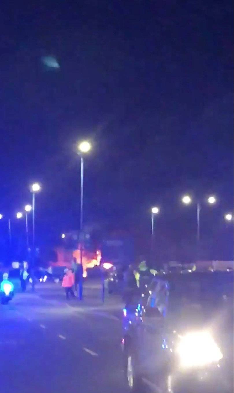 Flames are seen at a site where the helicopter belonging to Leicester City football club owner Vichai Srivaddhanaprabha crashed outside the King Power Stadium, Leicester