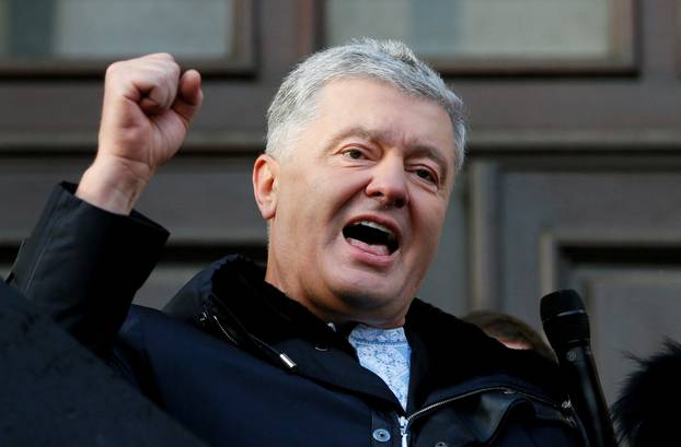 FILE PHOTO: Ukrainian former President Poroshenko leaves a court building in Kyiv