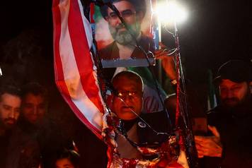 People gather after a two-week ceasefire in the Iran war was announced, in Tehran