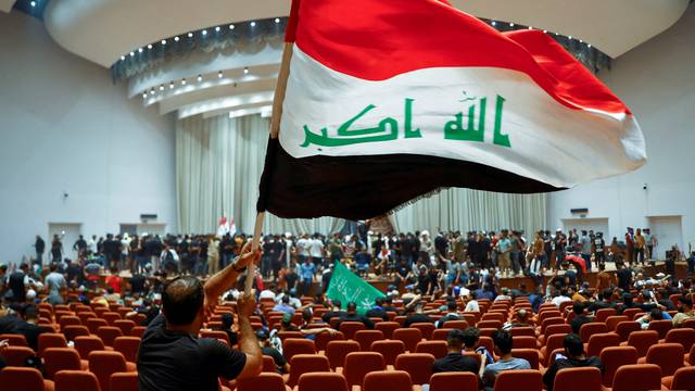 Supporters of Iraqi Shi'ite cleric Moqtada al-Sadr protest against corruption, in Baghdad