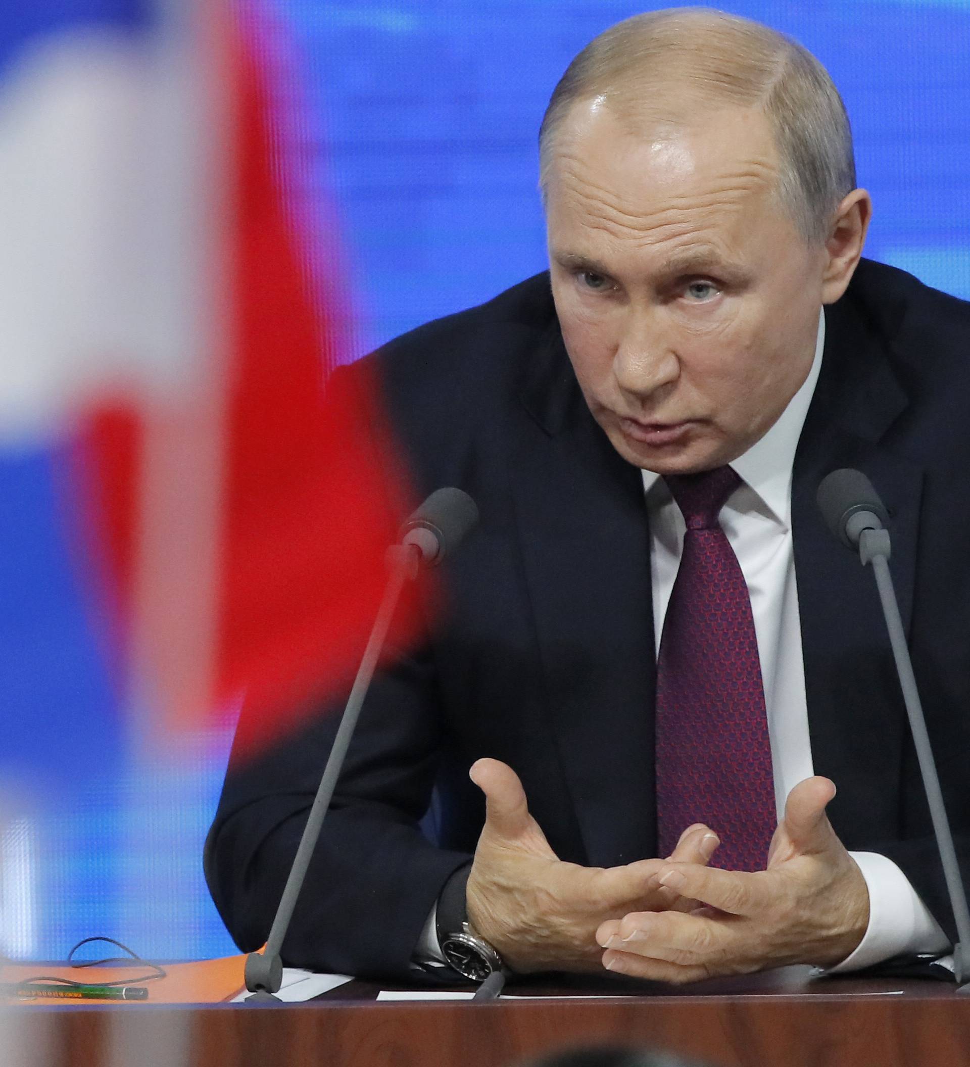 Russian President Putin speaks during annual news conference in Moscow